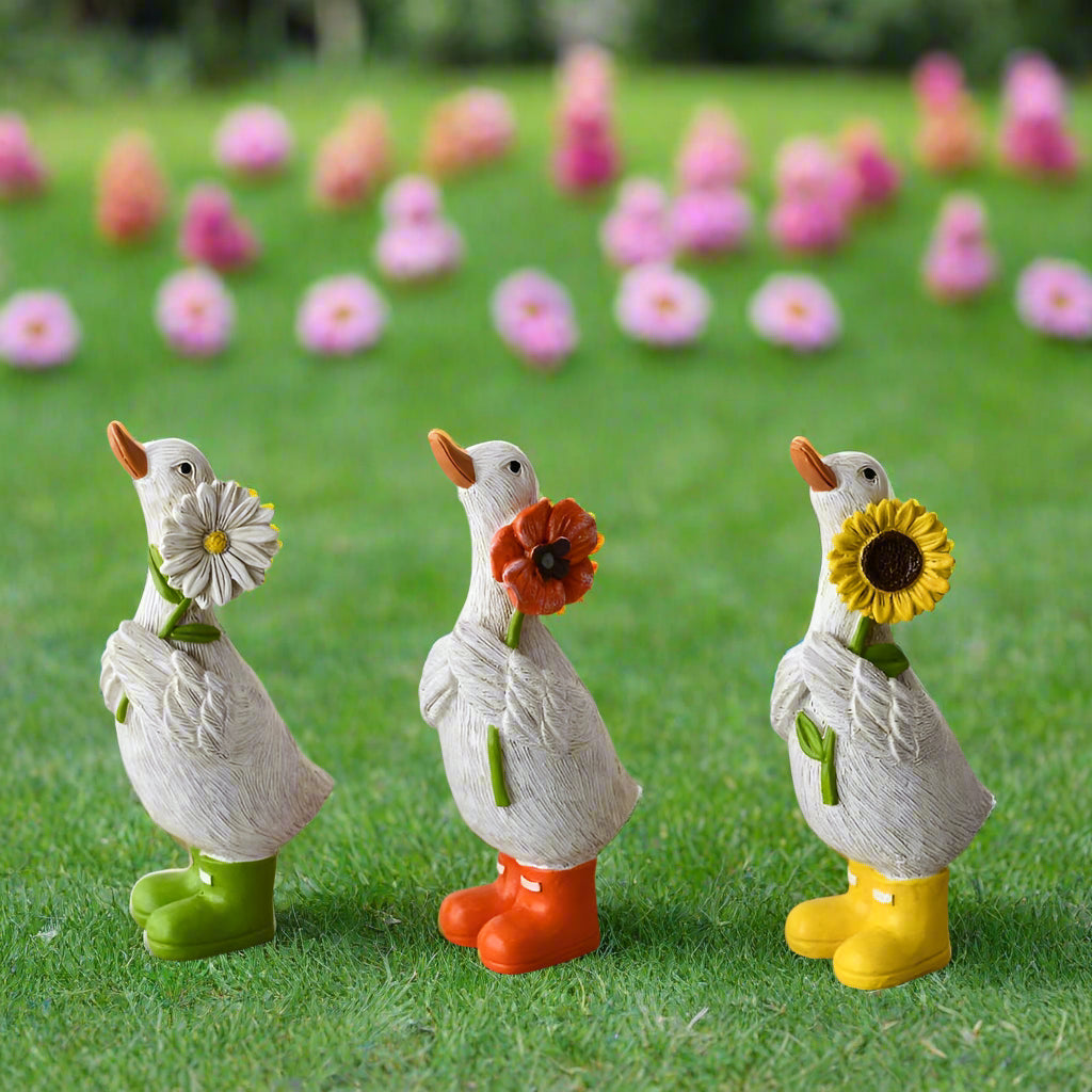 Duck in yellow boots with Sun Flower